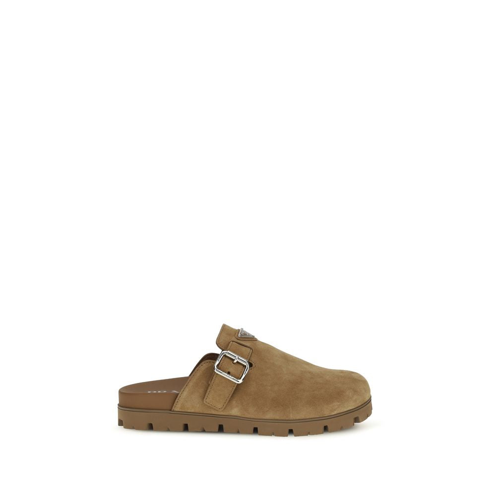 Prada Beige Calf Leather Bos Taurus Mules - Luxury Boutique Co