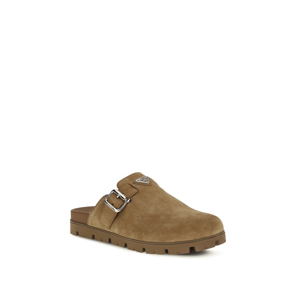 Prada Beige Calf Leather Bos Taurus Mules - Luxury Boutique Co