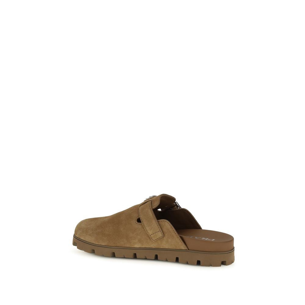 Prada Beige Calf Leather Bos Taurus Mules - Luxury Boutique Co