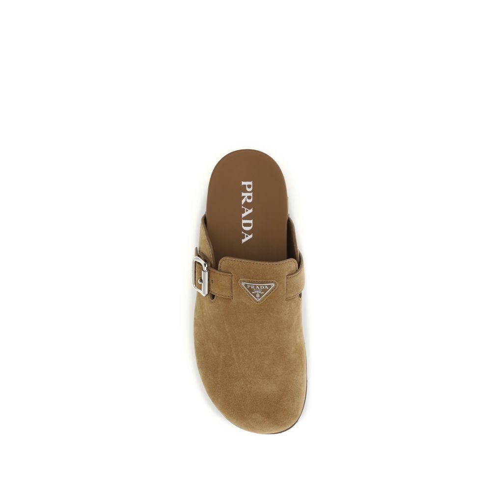 Prada Beige Calf Leather Bos Taurus Mules - Luxury Boutique Co